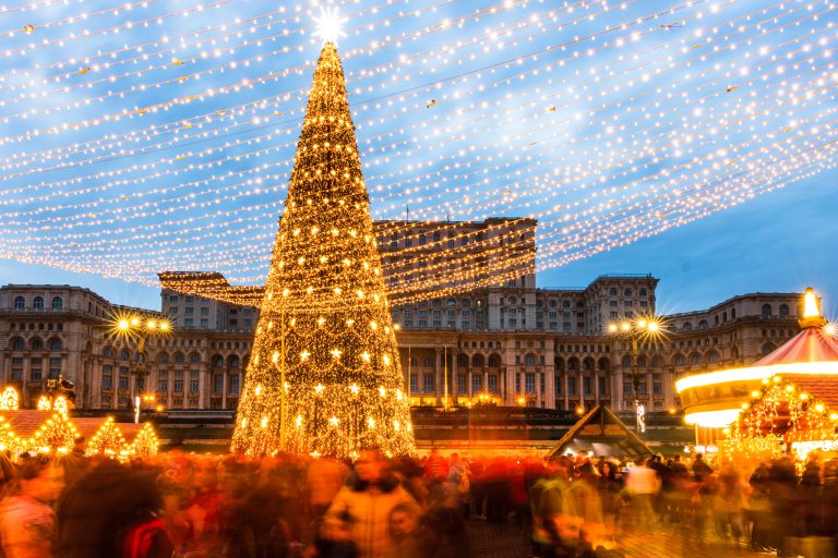 Bucharest Christmas market in front of the Palace of Parliament at night